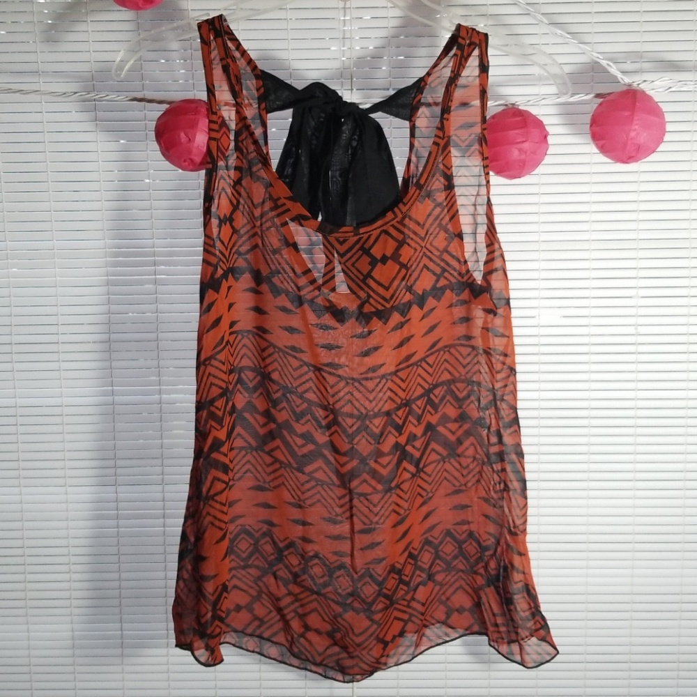 Edge orange and black sheer top